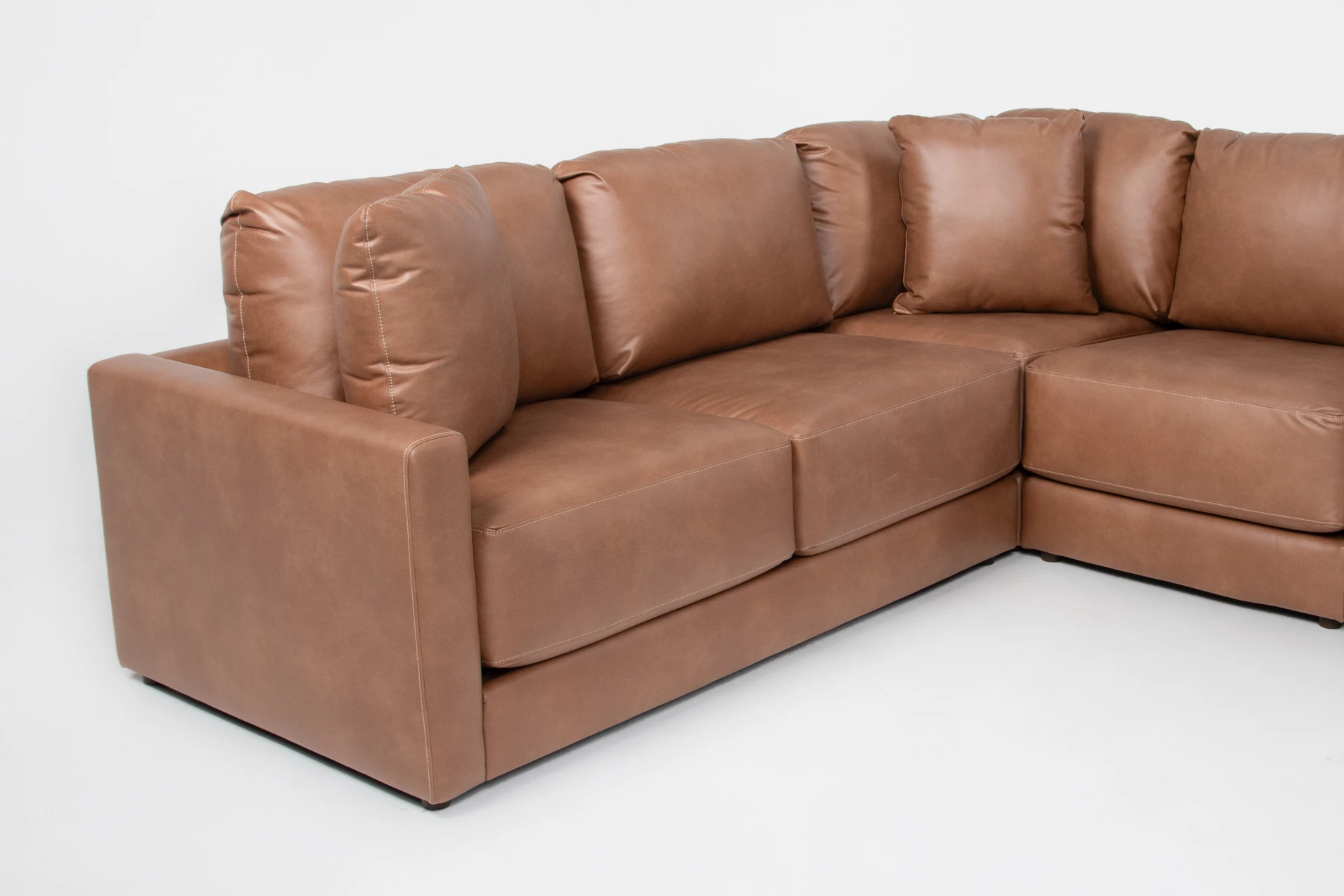 alicia saddle brown vegan faux leather 140" 4 piece sectional with right arm facing chaise | fabric | loose reversible back 9 alicia saddle brown vegan faux leather 140" 4 piece sectional with right arm facing chaise | fabric | loose reversible back
